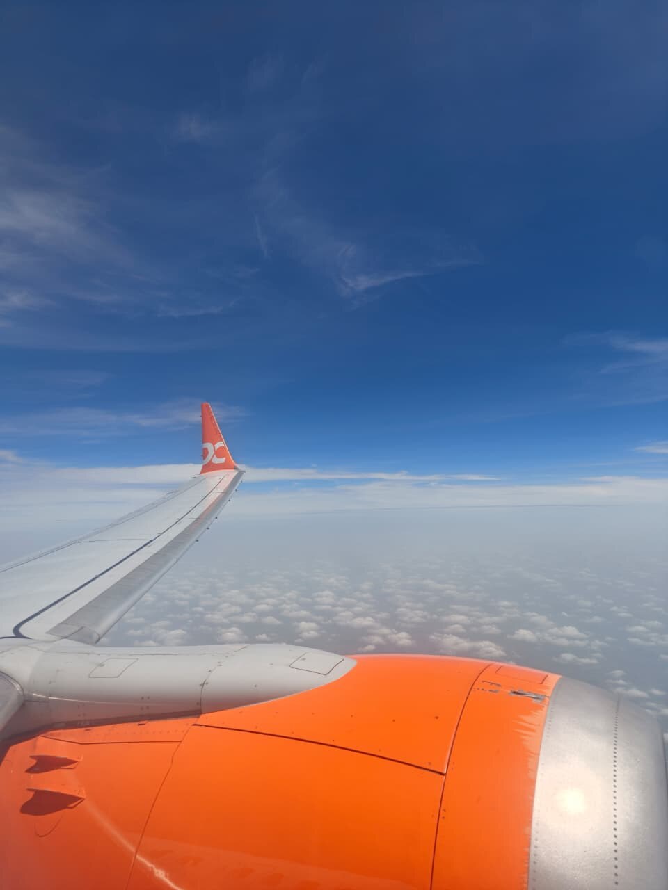 Air India Express wing above clouds on the Goa trip