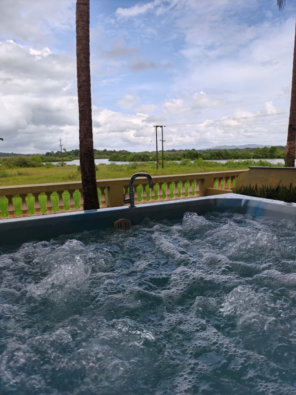 Jacuzzi with river view at Mercure Goa Devaaya
