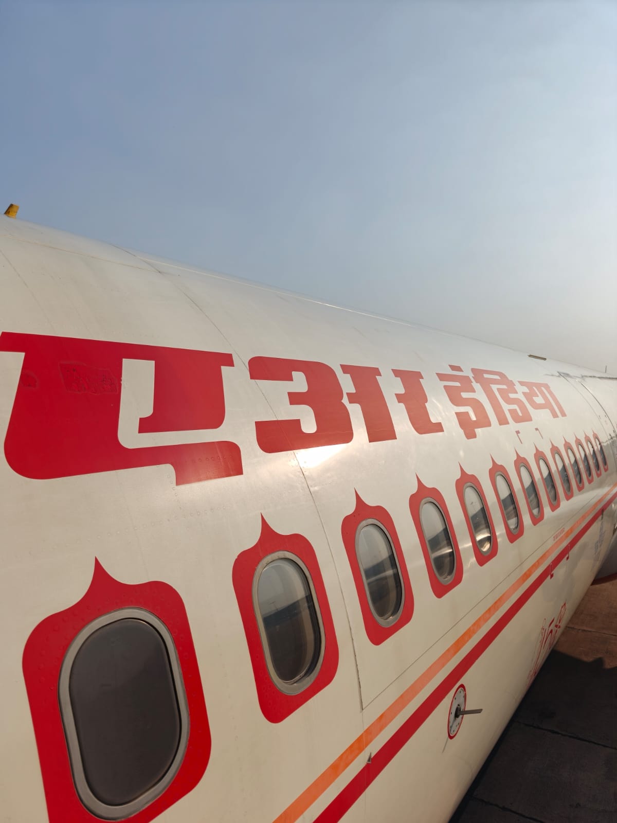 Air India fuselage with Hindi livery and windows